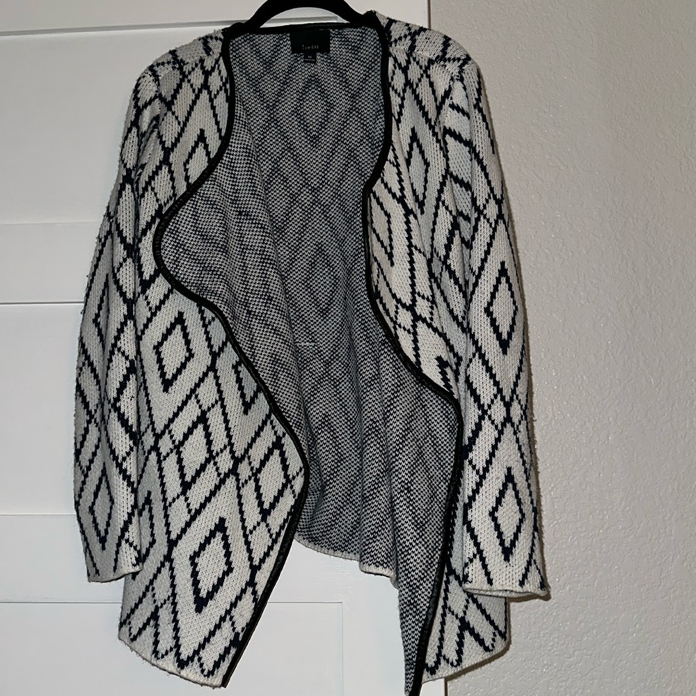 Women’s open sweater with black leather detailing